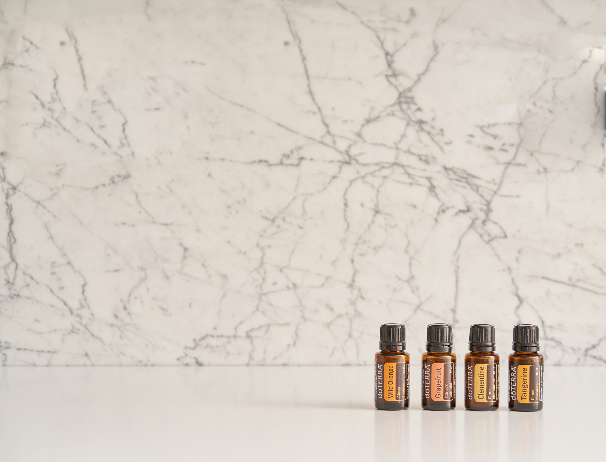 Brown Oil Bottles on a White Surface